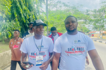 Comrade Victor Ogechukwu (right) during the drug movement in Calabar, Cross River state.