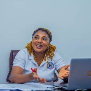 Miss Christiana Ejembi, Manager of ADUN Microfinance Bank, Igbuzo Centre, speaking during a media chat in Igbuzo, Delta State