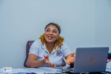 Miss Christiana Ejembi, Manager of ADUN Microfinance Bank, Igbuzo Centre, speaking during a media chat in Igbuzo, Delta State